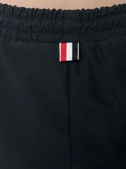 Thom Browne 4 Bar Stripe shell track pants performance track pants of women 9 Thom Browne 4-Bar Stripe shell track pants